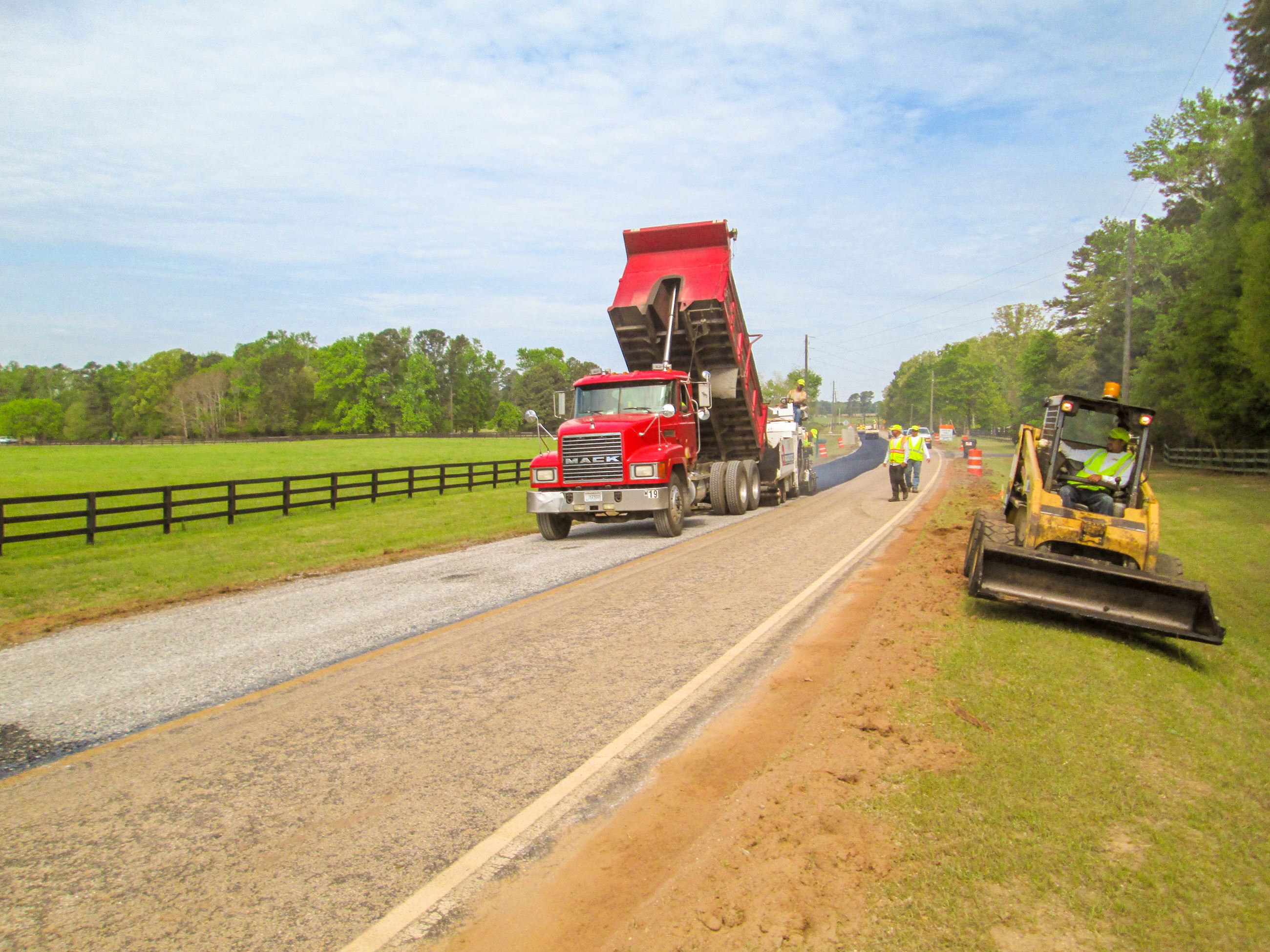 Photo of Public Works Crew Paving a Road